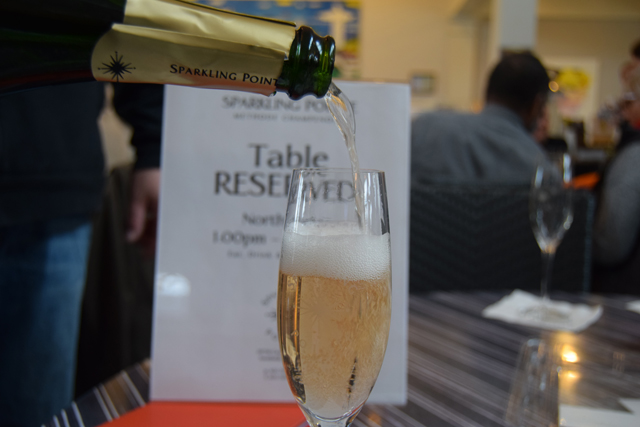 A glass of Sparkling Pointe Topaz Imperial.