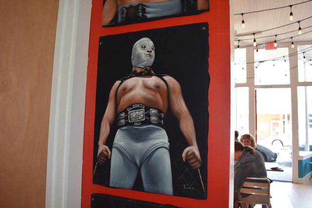 A Luchador painting inside Lucharitos in Greenport.