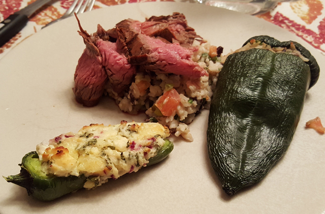 Flank steak with a roasted jalapeño popper and a stuffed Anaheim pepper. (Credit: John Ross)