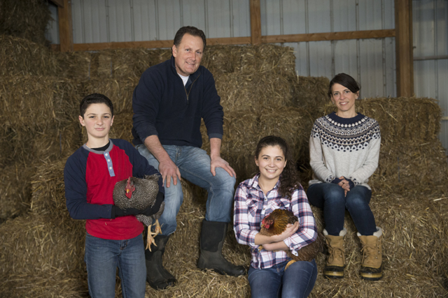 Tom Geppel, his wife Carol Festa and their two children, Max 12 and Olivia, 16, at 8 Hands Farm in Cutchogue. (Credit: Randee Daddona)
