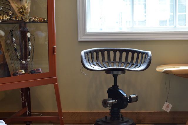 This piece by Eric Giles features an antique tractor seat. The chair is available at North Fork Craft Gallery. (Credit: Vera Chinese)