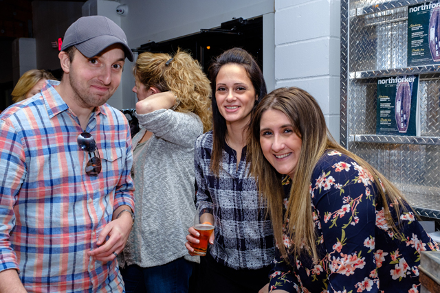 Times Review Media Group editor Joe Werkmeister, grpahic designer Maria Gennaro and marketing coordinator Liz Werkmeister.