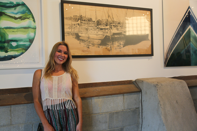 Artist Kelly Franké with one of her drawings.