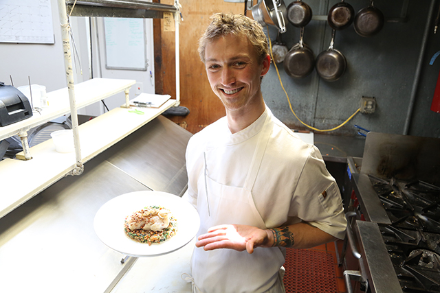 Chef Stephan Bogardus in the kitchen at North Fork Table and Inn while filming a video for northforker.com. (photo credit: Krysten Massa)